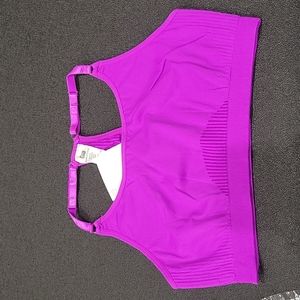NWT Fabletics Samantha sports bra, size M. Purple. Racerback style. Adjustable.